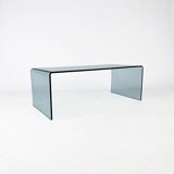 Postmodern coffee table made entirely of glass. Modernist and bitches minimalist look.