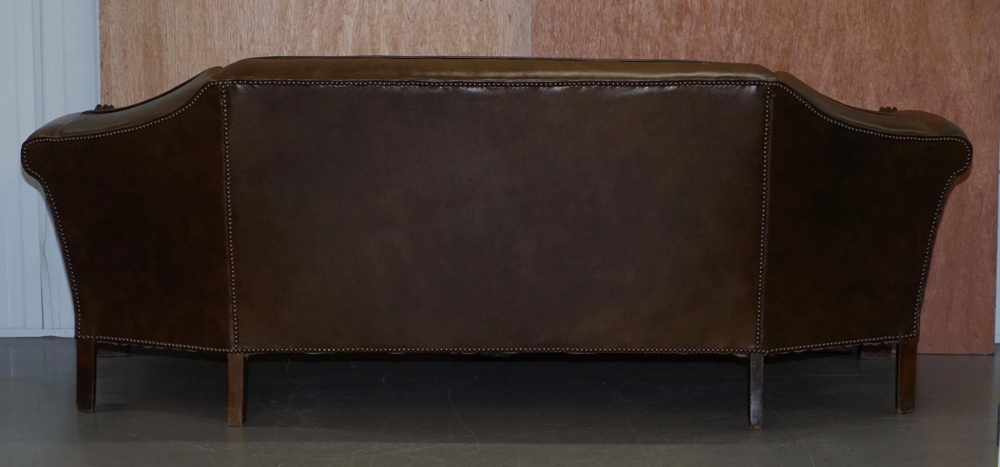 Restored Regency canapé in leather with sculpted Hermès frame.