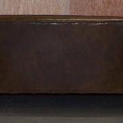 Restored Regency canapé in leather with sculpted Hermès frame.