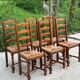 6 solid oak and straw chairs with high backs