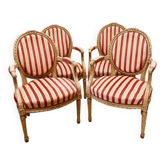 Suite of four Louis XVI style medallion armchairs in 20th century patinated wood