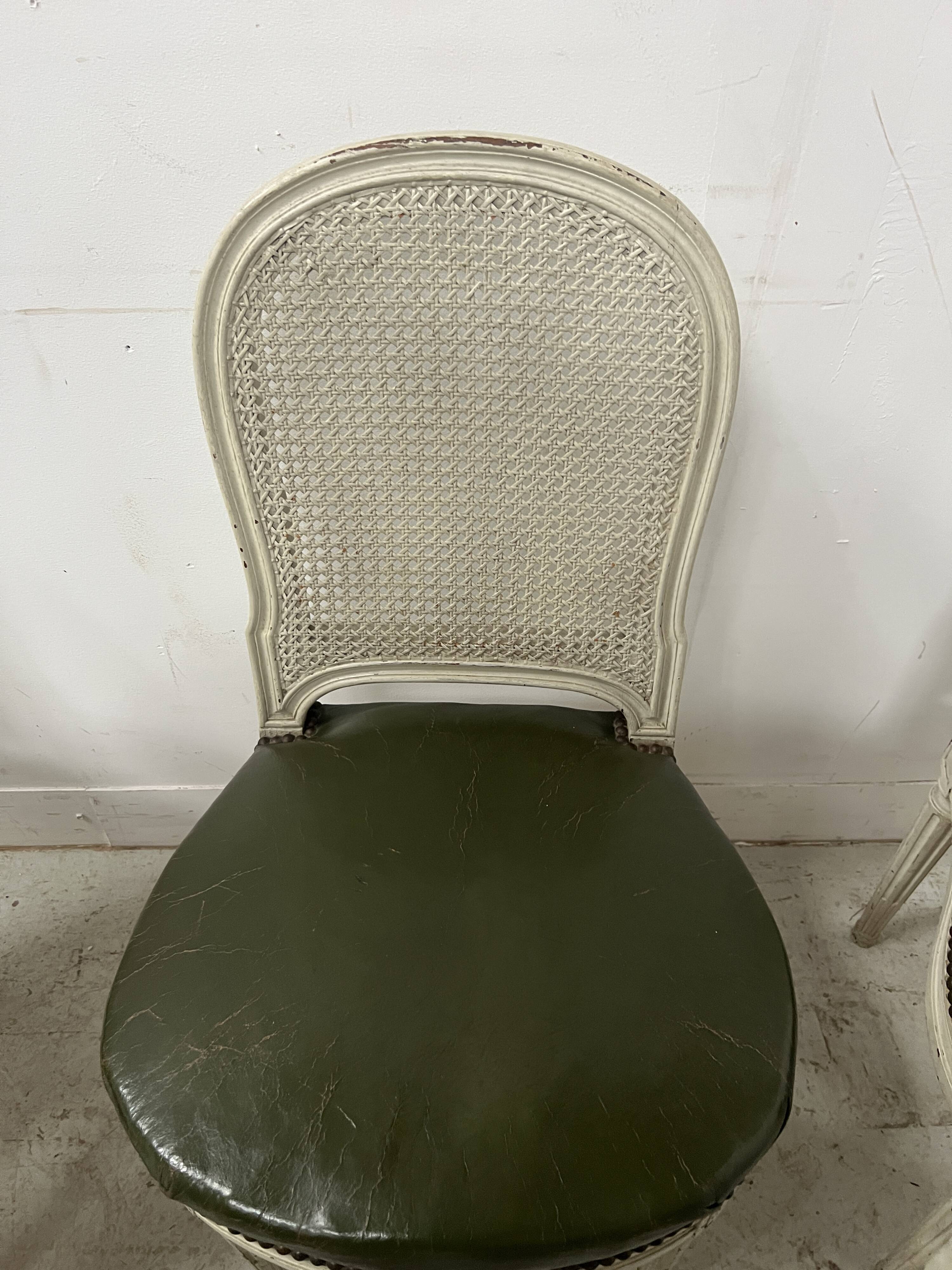 Set of seven Louis XVI style chairs in patinated beech, 20th century.