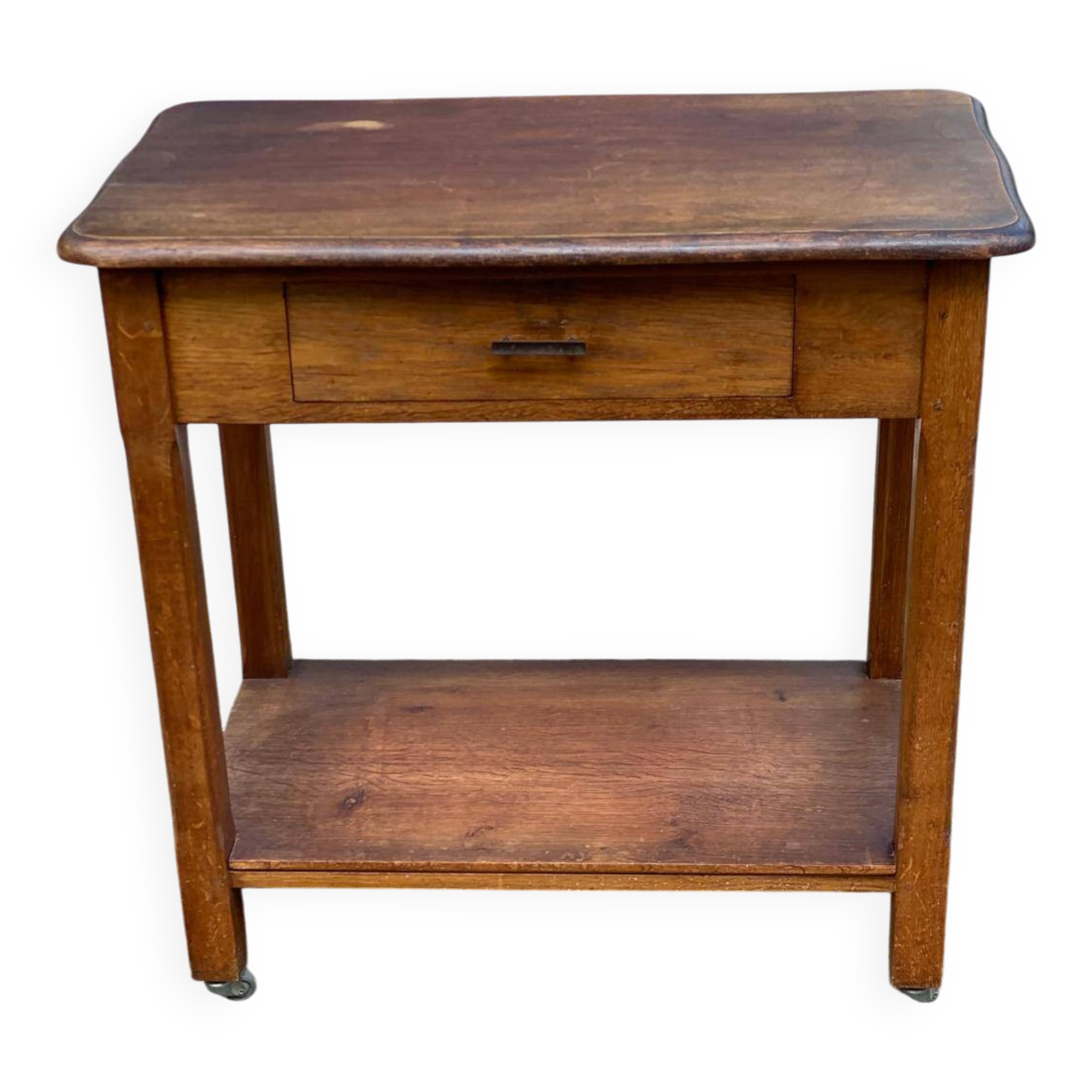 Vintage farmhouse dessert trolley on wheels made of solid wood from the 19th century.