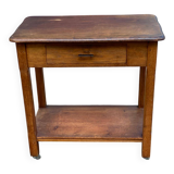 Vintage farmhouse dessert trolley on wheels made of solid wood from the 19th century.