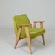 Fauteuil vintage en velours vert poire, bois naturel huilé.