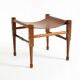 Rare 1990s safari stool with a teak frame and a seat made of brown saddle l