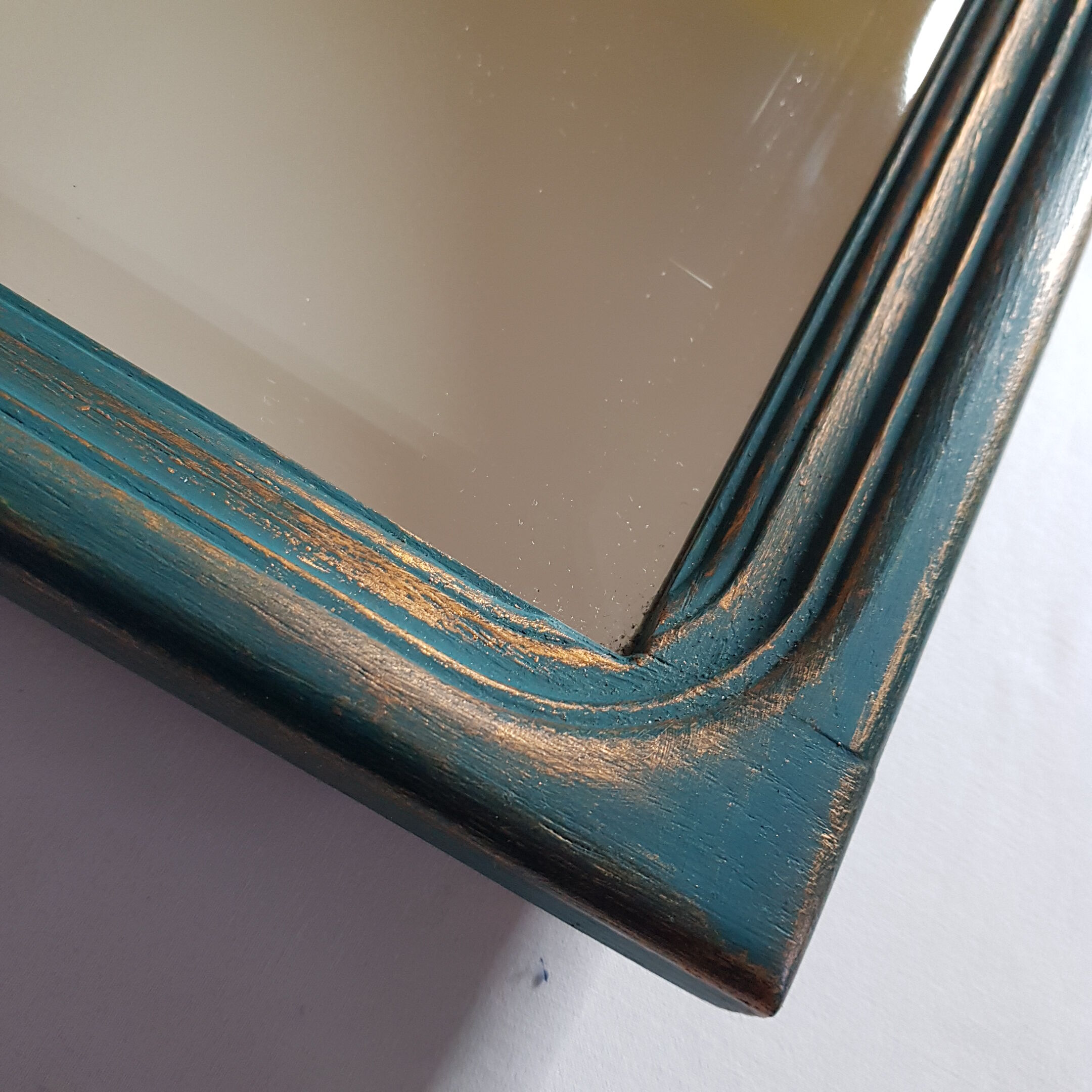 Mirror carved wooden frame and bevelled ice shell decoration 72 cm x 49 cm