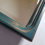 Mirror carved wooden frame and bevelled ice shell decoration 72 cm x 49 cm