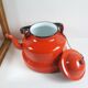 Red enamelled kettle