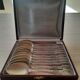 Box of 12 small old spoons in silver metal
