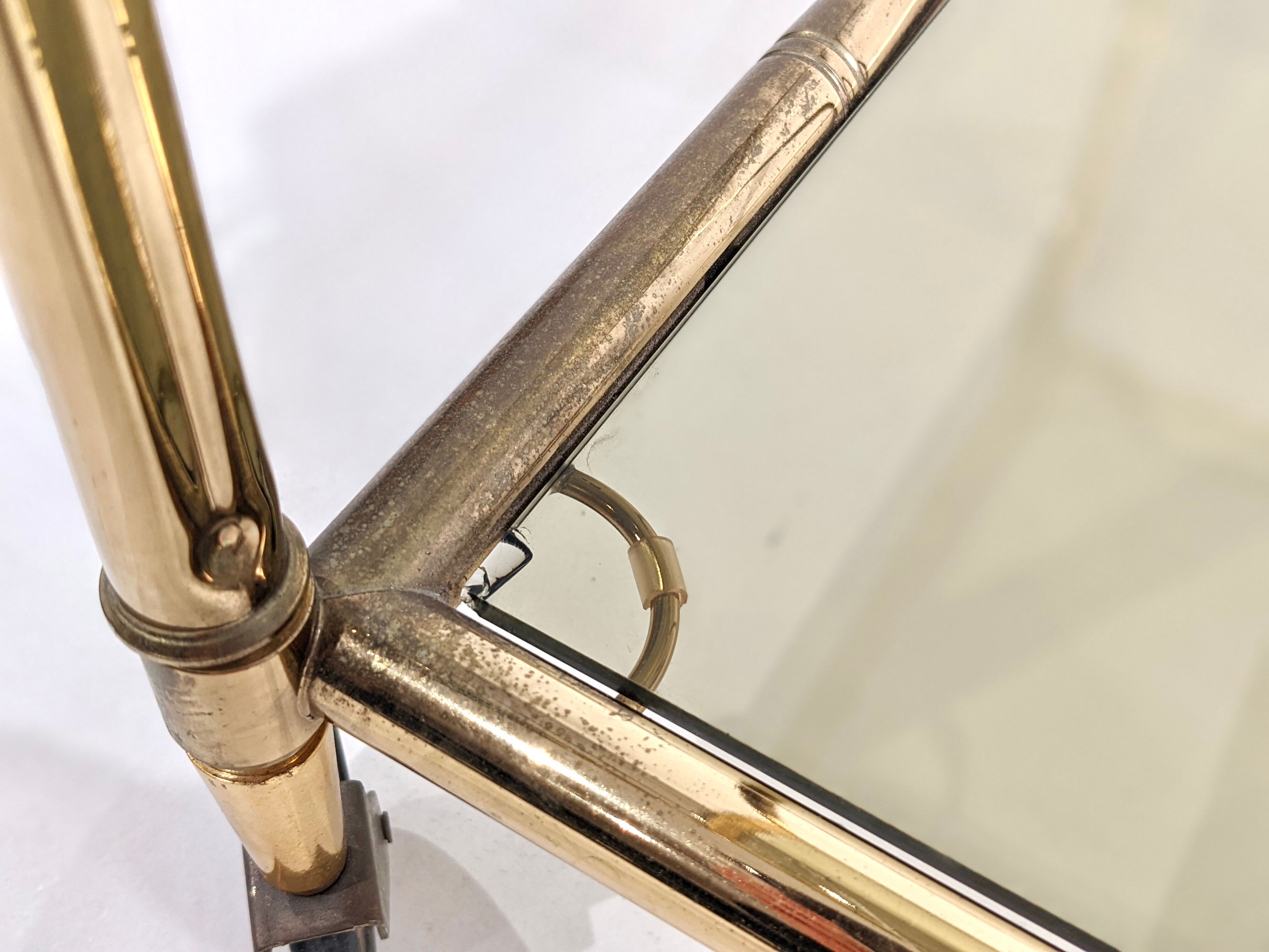 Golden metal dessert with tinted glass tops