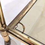 Golden metal dessert with tinted glass tops