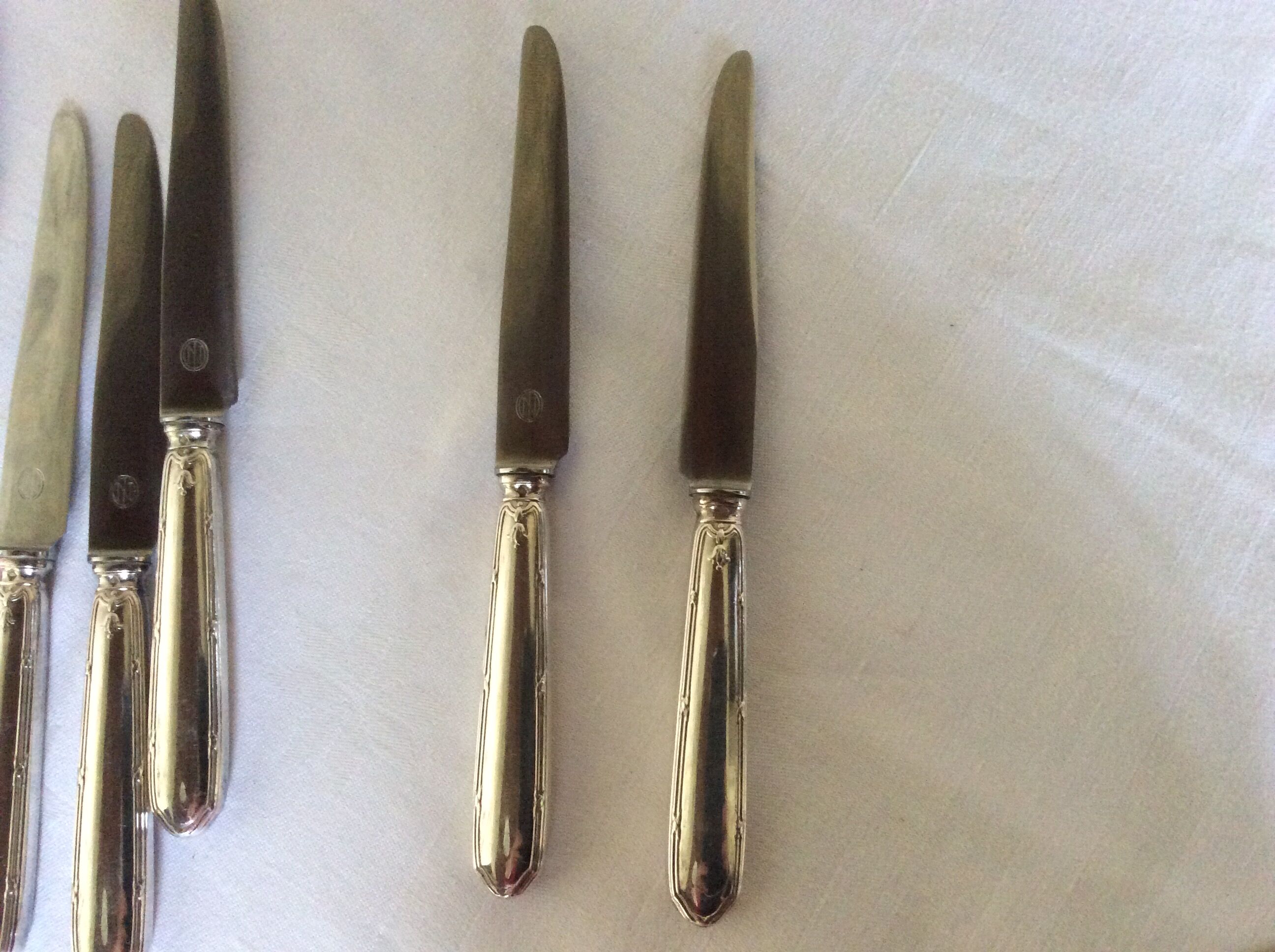 12 entremet knives, silver metal, cross ribbons