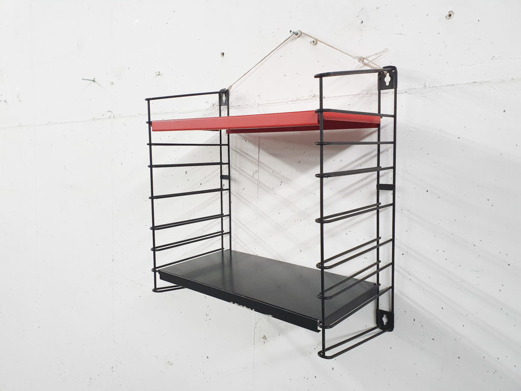 Red and black metal book shelves by Tomado, The Netherlands 1950's