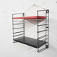 Red and black metal book shelves by Tomado, The Netherlands 1950's
