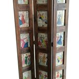 Wooden screen with vintage haute couture images or for photos