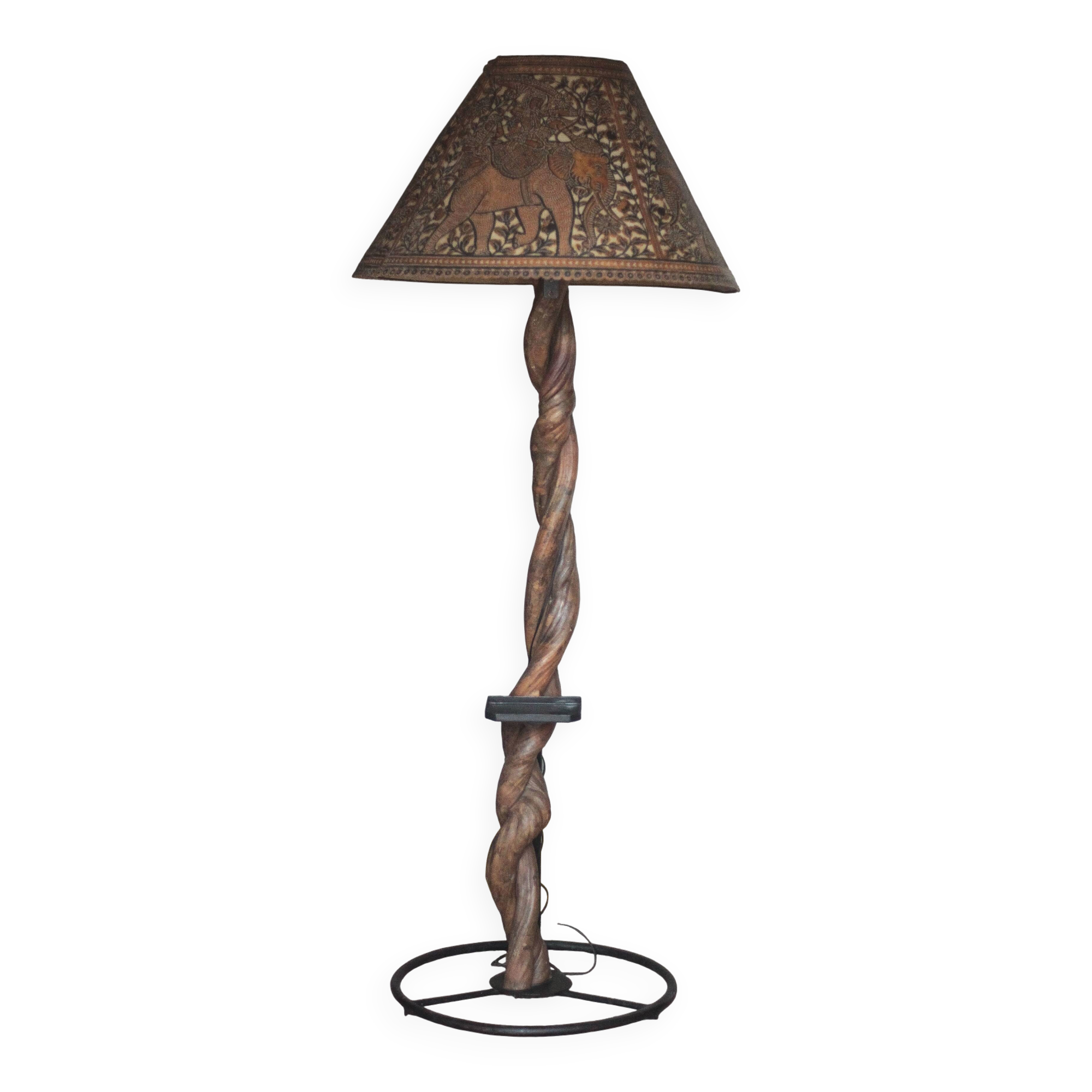 Liane and metal floor lamp with perforated leather shade featuring elephant patterns, lise.