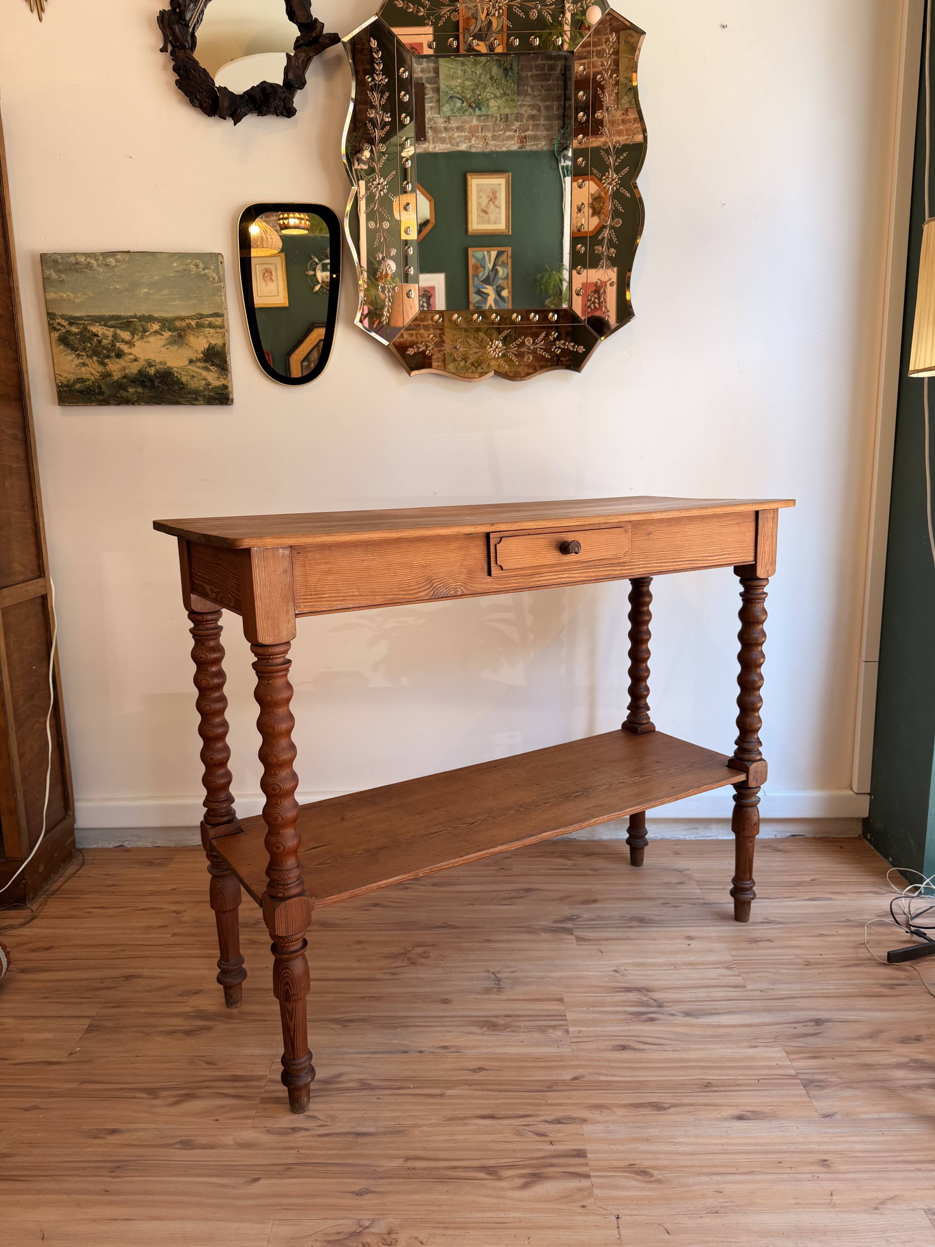 Large console or shop sideboard in pitch pine, early 20th century.