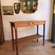 Large console or shop sideboard in pitch pine, early 20th century.