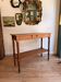 Large console or shop sideboard in pitch pine, early 20th century.