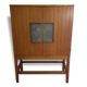 Bar cabinet opening with 2 doors from the 1950s.