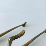 Pair of vintage brass hooks