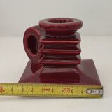 Pair of art deco candlesticks in bordeaux ceramics