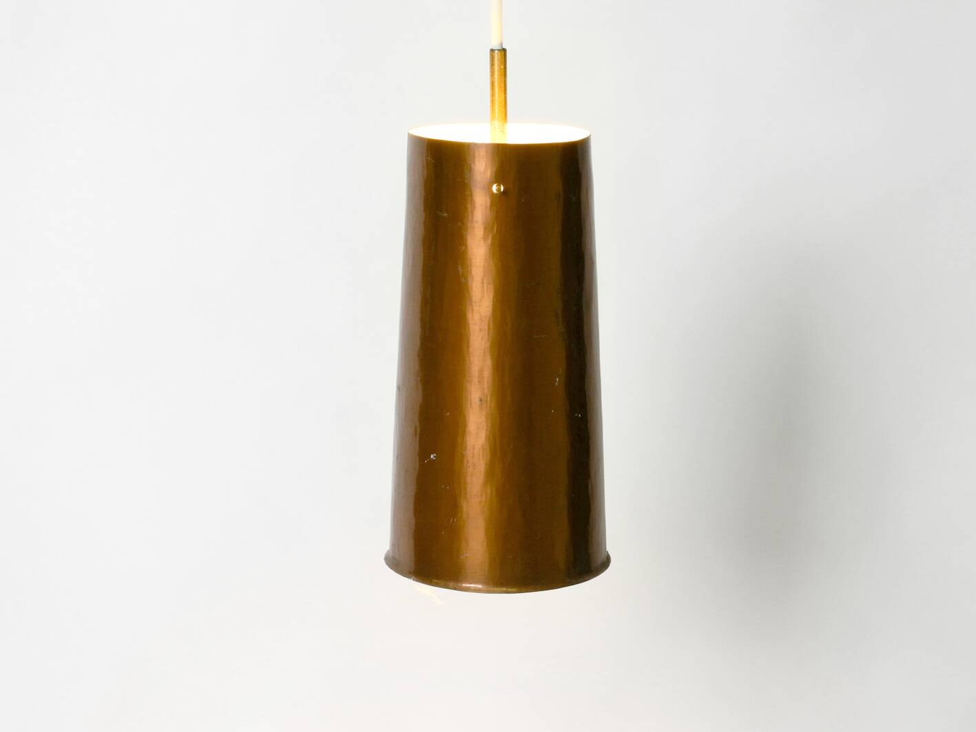 Beautiful Mid Century Modern pendant lamp made of copper shaped like a cone
