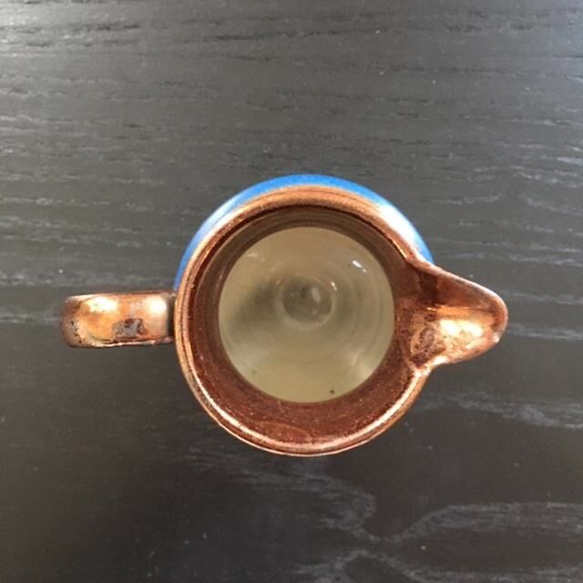 Two-tone copper and blue pitcher
