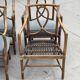 Set of 4 vintage McGuire rattan chairs with cushions.
