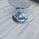 Olympe table with swivel tops in glass and gray ceramic