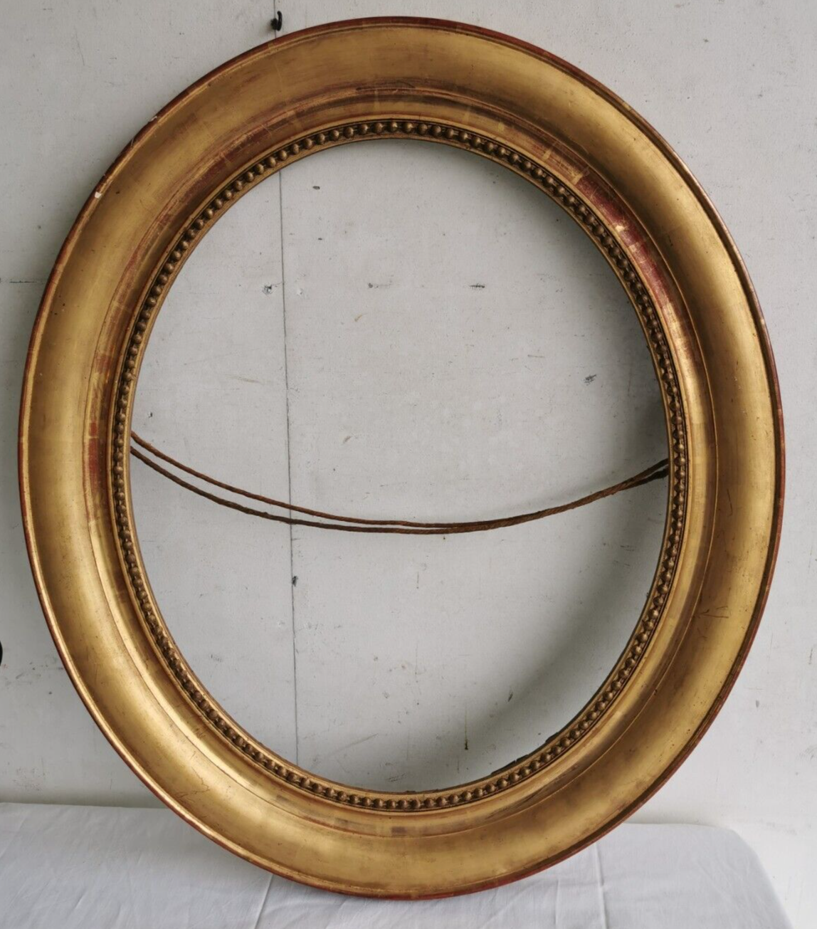 Frame oval 1st moitie of the xixth wood golden stucco