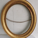 Frame oval 1st moitie of the xixth wood golden stucco