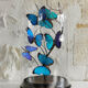 Papillons Morpho sous globe verre