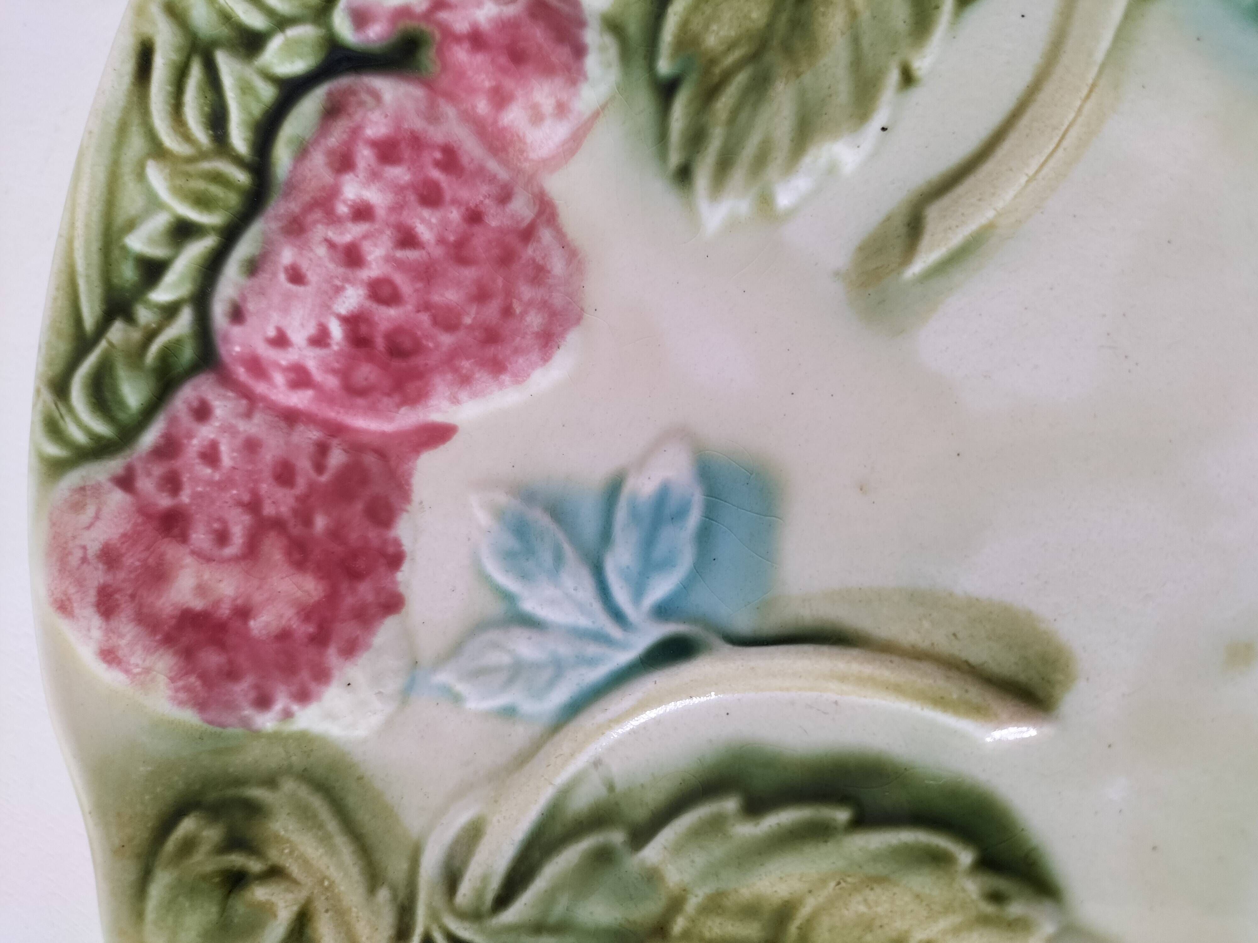 Barbotine plate with strawberries in relief, late 19th and early 20th century