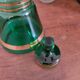 Green and gold glass carafe