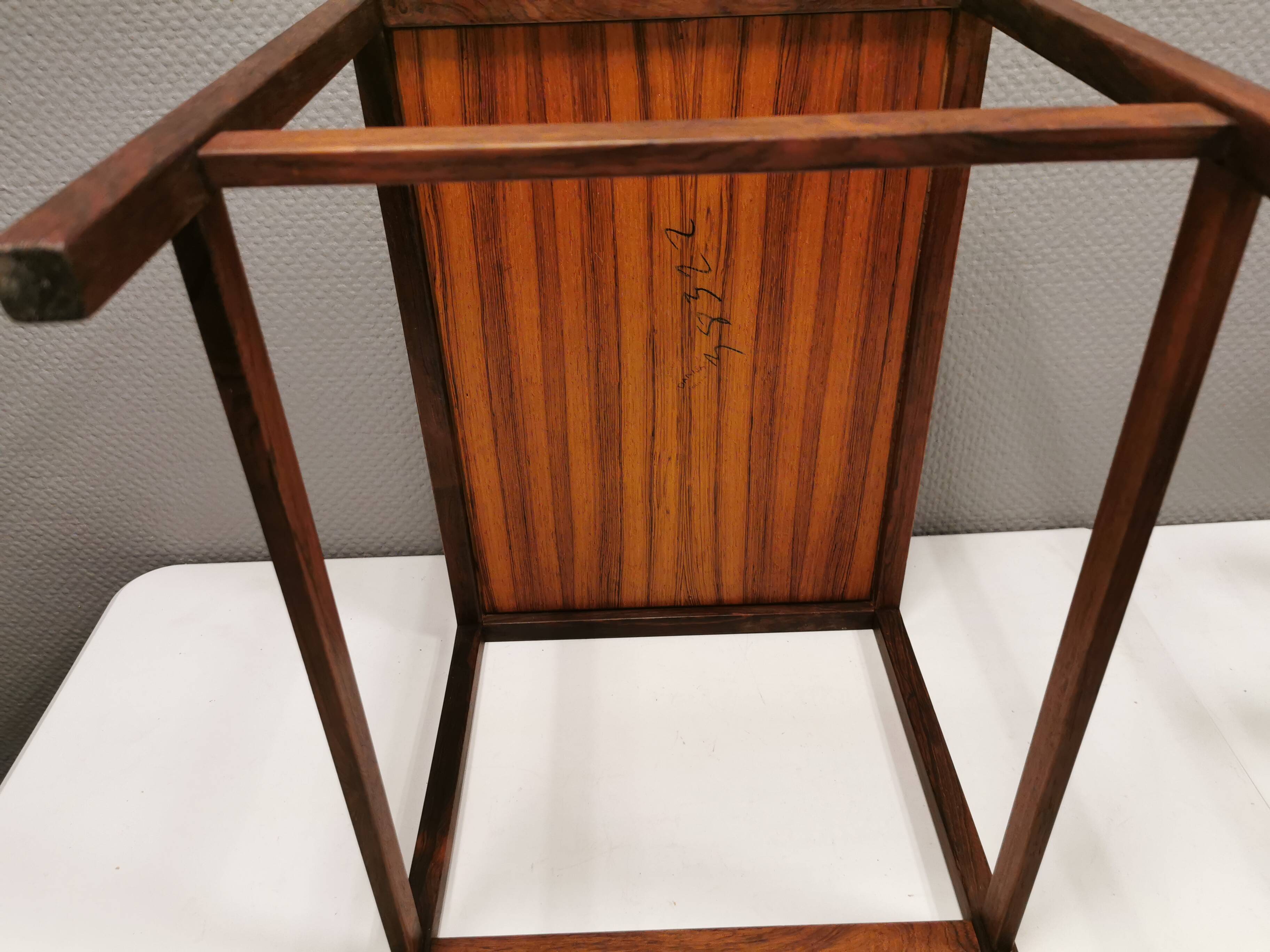 Smaller lamp/Side table of rosewood with black formica tabletop, designed by Kurt Østervig.