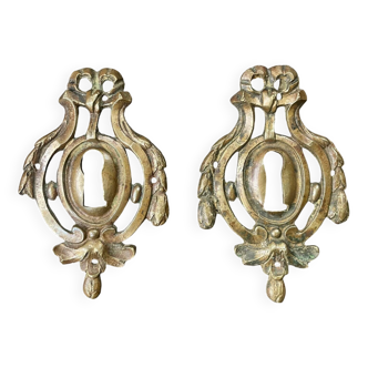 Pair of bronze lock entries, Louis XVI period