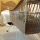 Rattan and wrought iron cradle