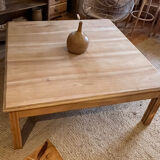 Large square antique coffee table made of raw solid wood.
