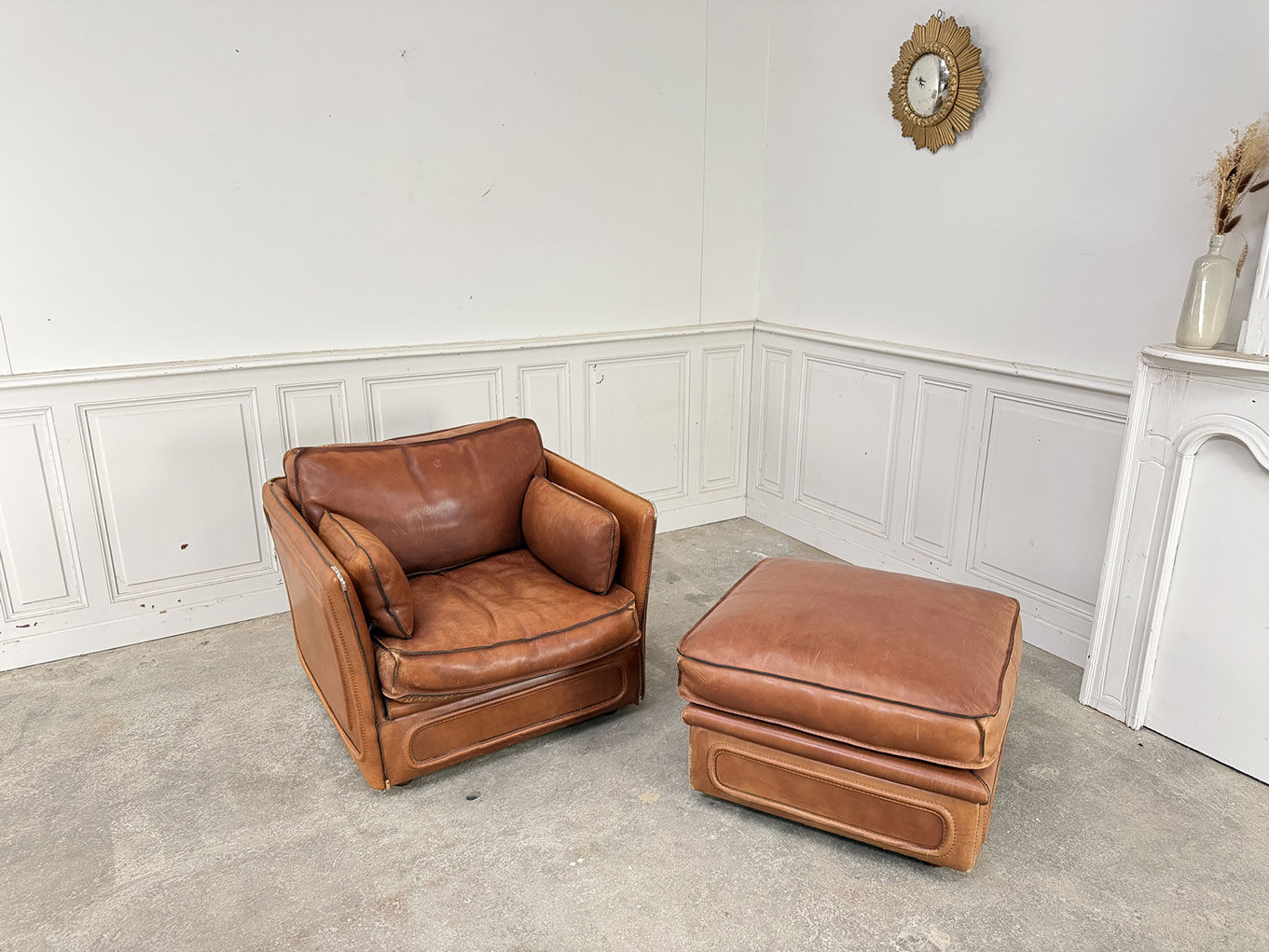 Club armchair and its ottoman 1980s