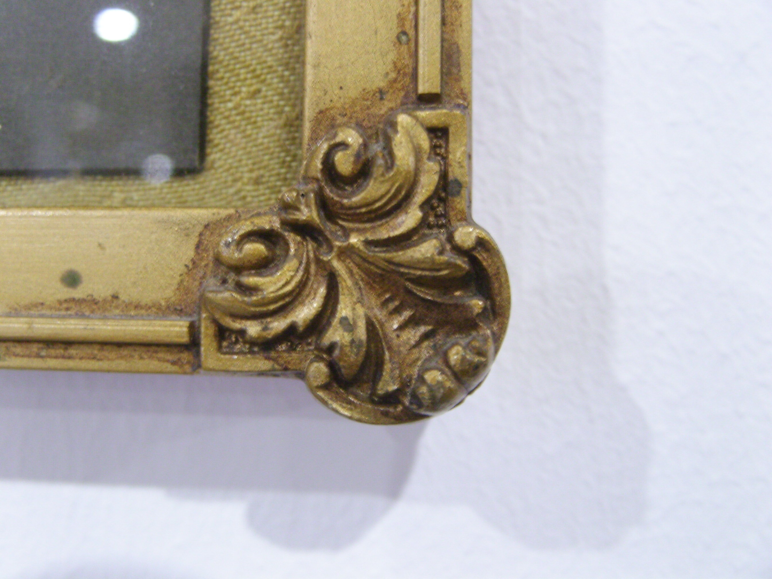 Former Art Deco photo frame with children's photo and wooden horse
