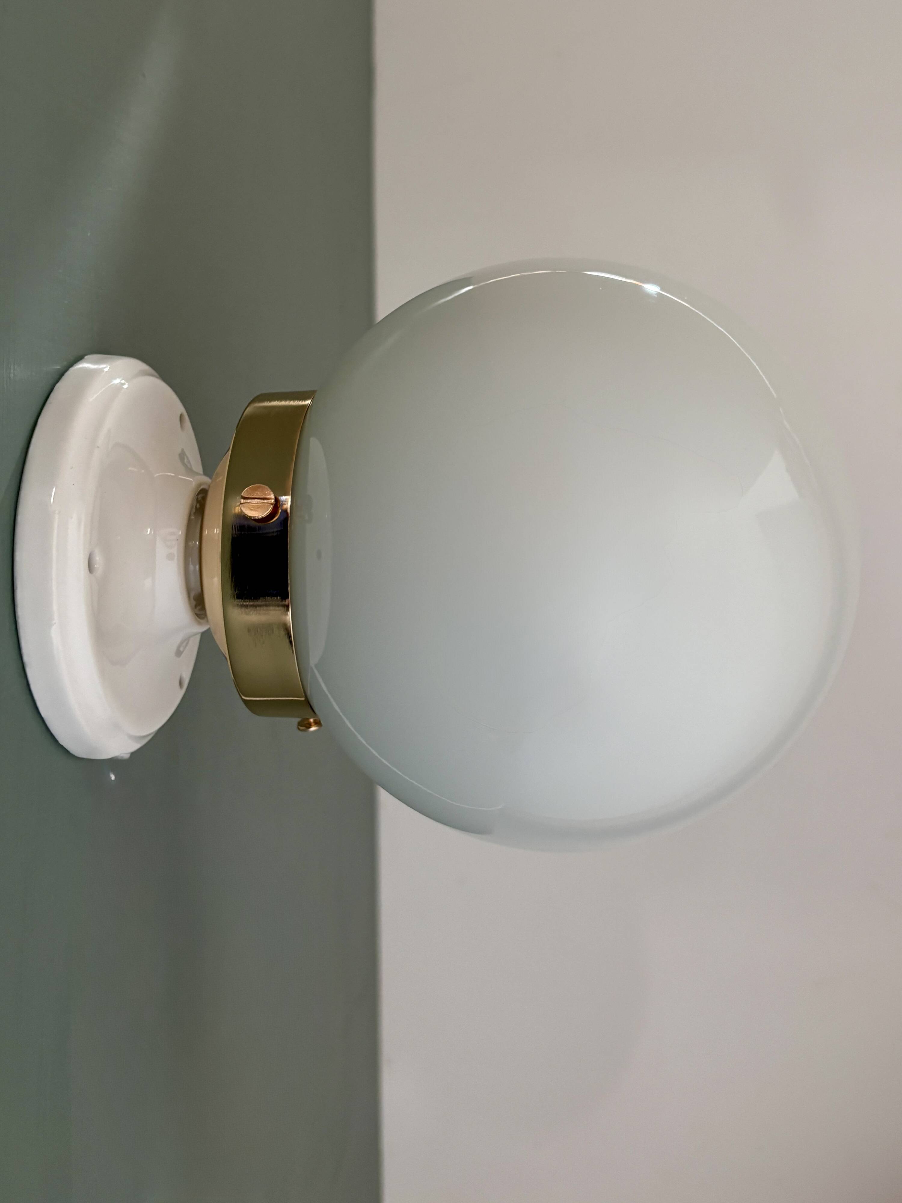 Vintage wall or ceiling light globe in white opaline.
