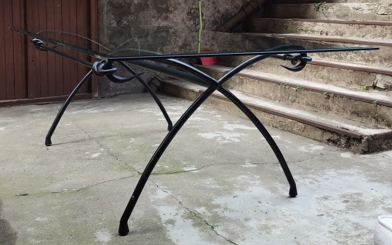 Wrought iron and glass dining table