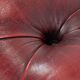 Red English cowhide Chesterfield armchair finished with decorative nails