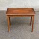 Vintage rectangular side table in solid oak from the 1920s.