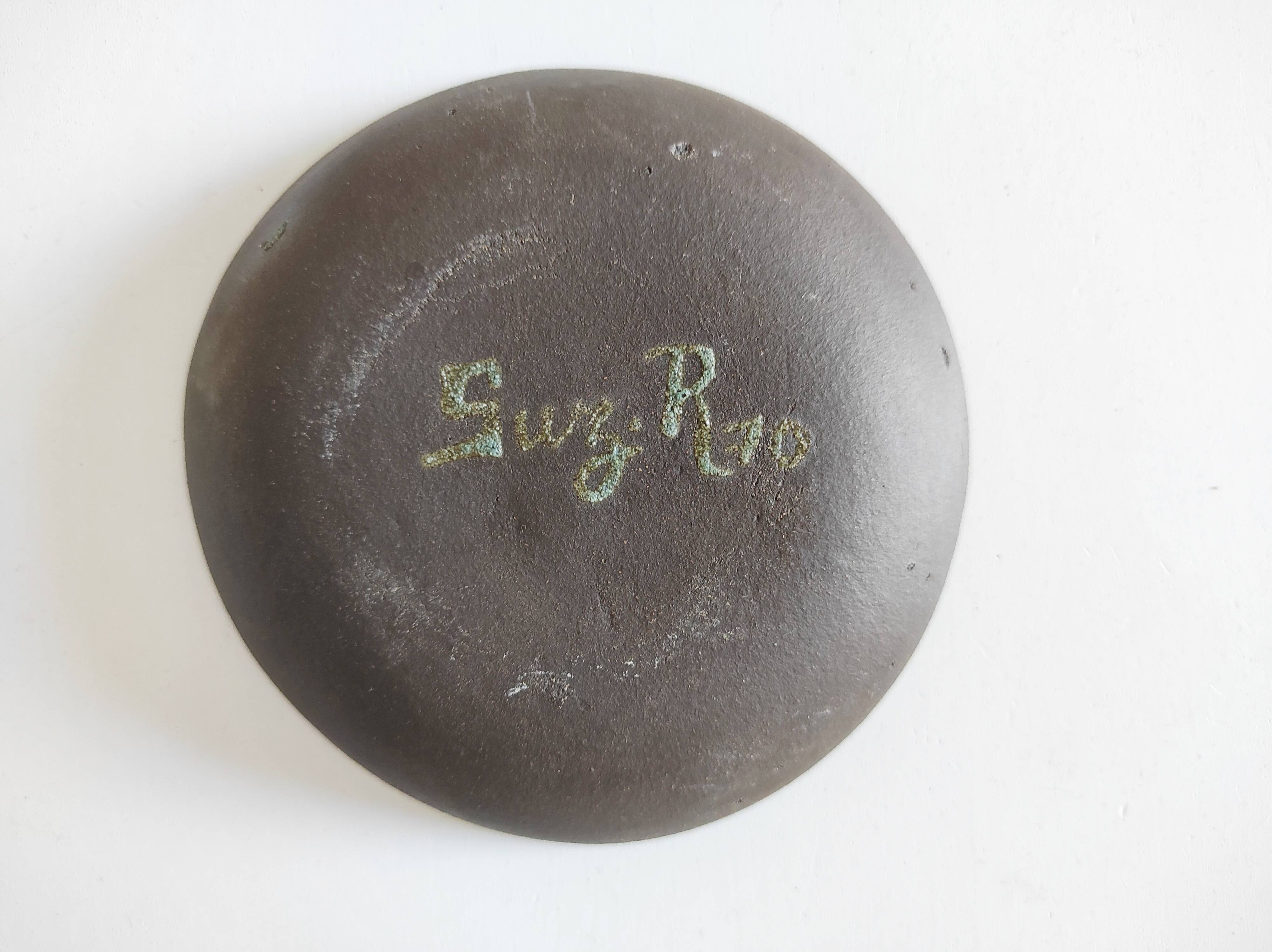Empty ceramic pocket cup signed Suz