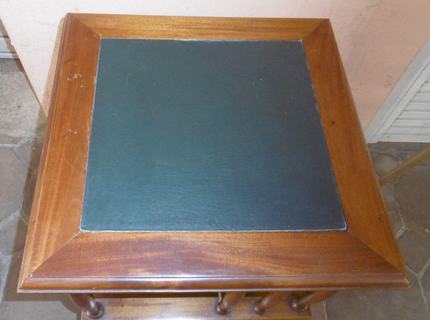Mahogany rolling library with green leather top