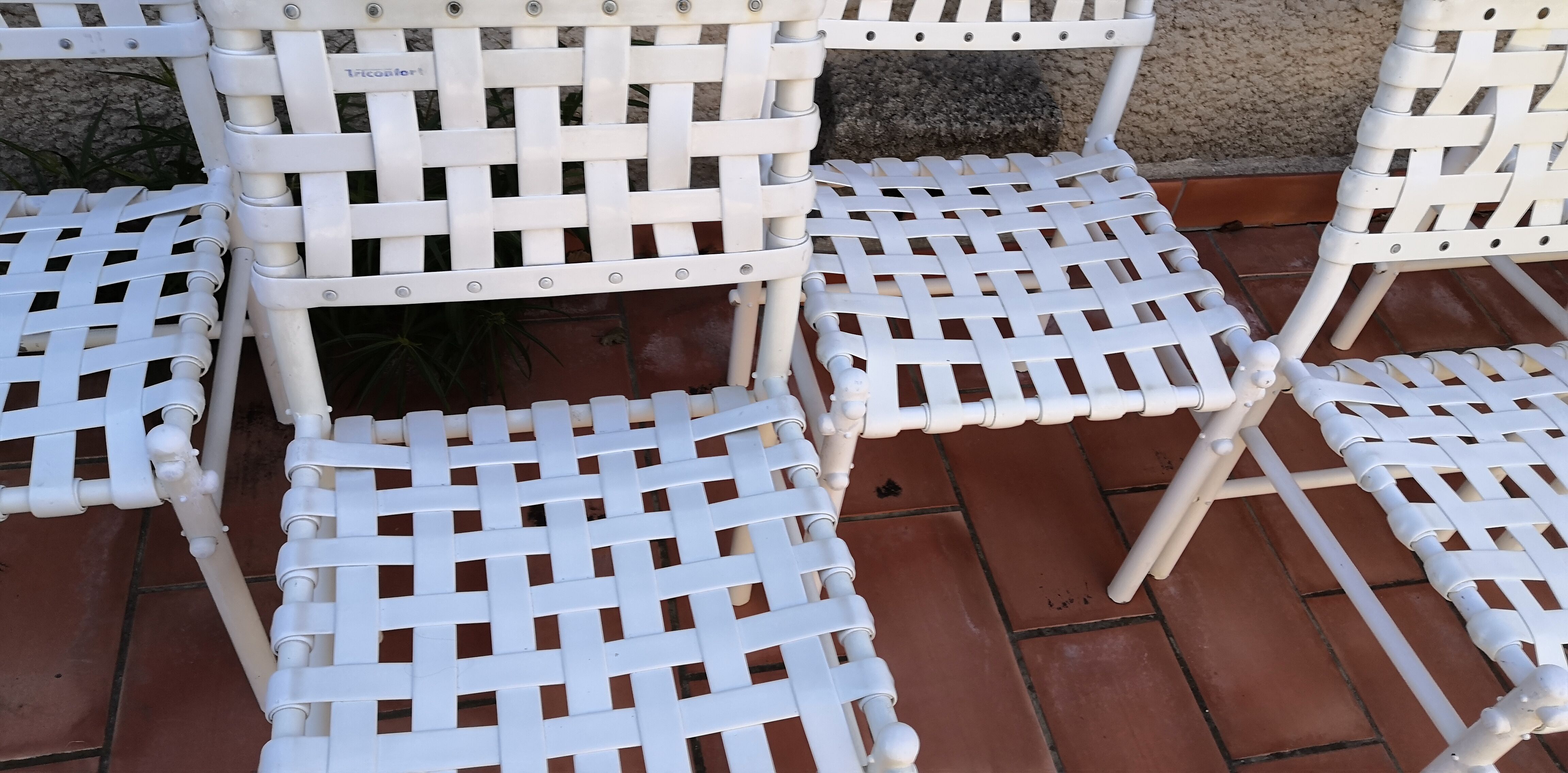 Suite de 7 chaises tressées triconfort vintage