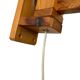Vintage wooden wall lamp with rope detail.